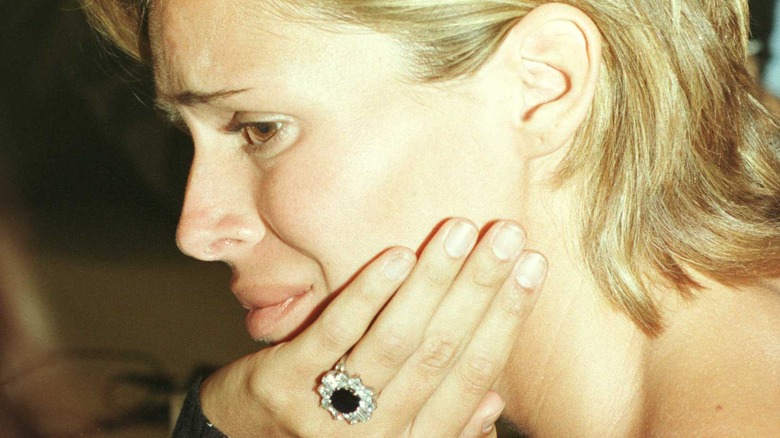 Kelly Fisher wearing engagement ring