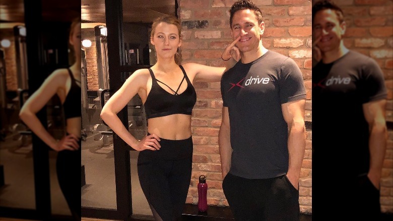 Blake Lively poses with her personal trainer