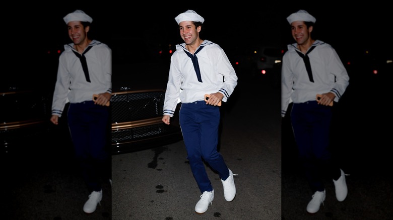 David Dobrik walking in a sailor costume