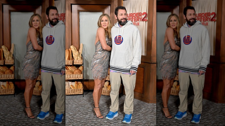 Adam Sandler and Jennifer Aniston posing 