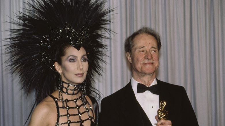 Cher and Don Ameche posing 