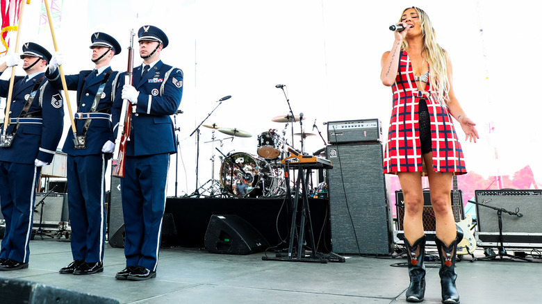 Sophia Scott with military and geo vest-dress