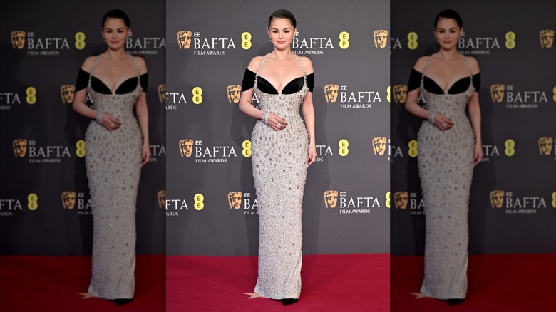 Selena Gomez wearing a silver and black dress at the 2025 BAFTA Awards