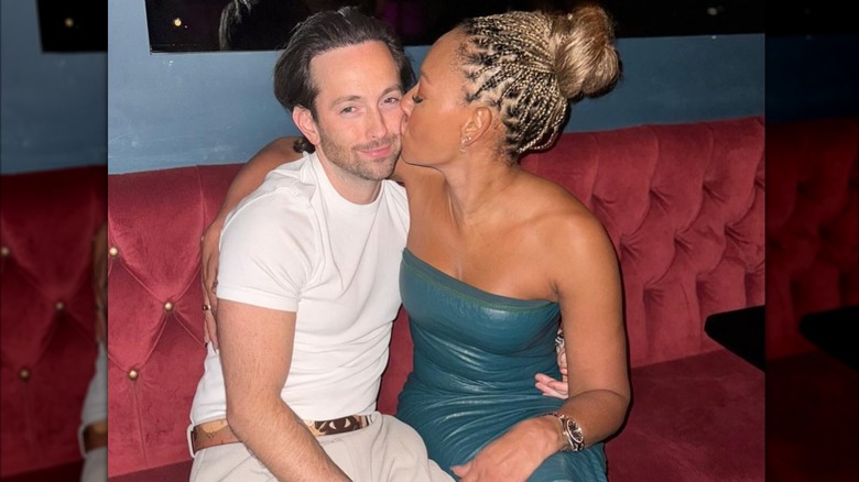 Mel B kissing  Rory McPhee  on the cheeks