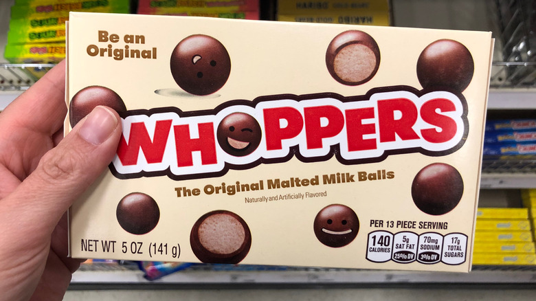 Hand holding Whoppers box