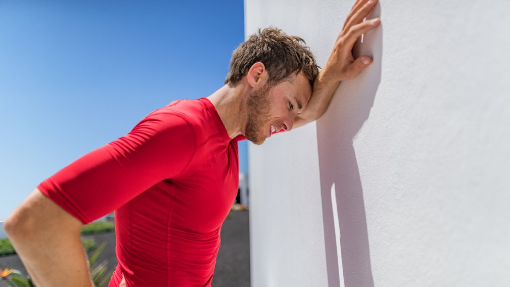 man tired from exercise