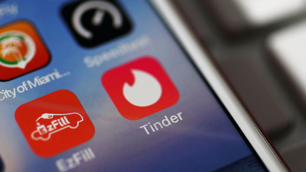 The Tinder app icon on an iPhone 