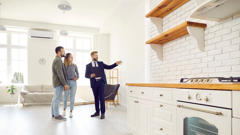 Young Couple Buying Home