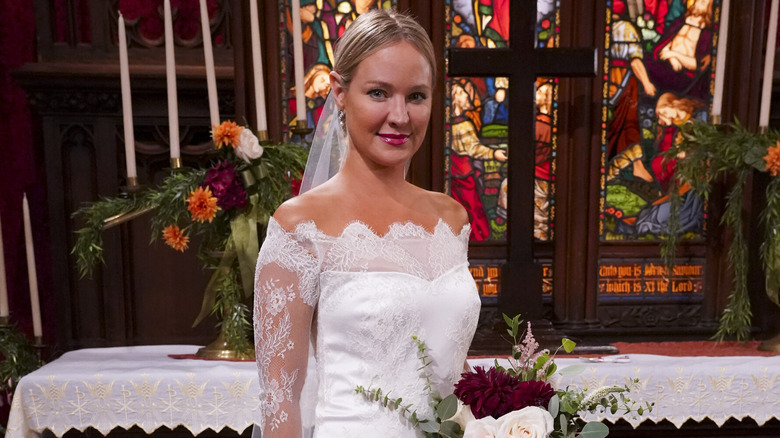 Sharon posing in her wedding gown