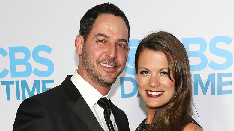 Melissa Claire Egan and husband Matt Katrosar smiling