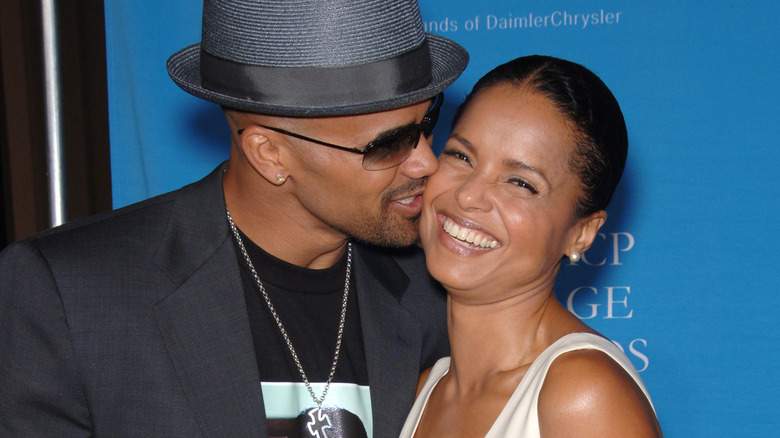 Shemar Moore and Victoria Rowell posing