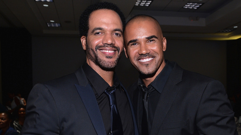 Kristoff St. John and Shemar Moore smiling