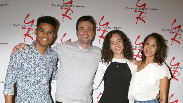 Alexander Gerry, Daniel Goddard, Christel Khalil, and Lexie Stevenson smiling