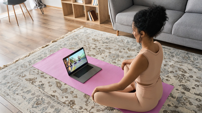 Woman doing yoga at home