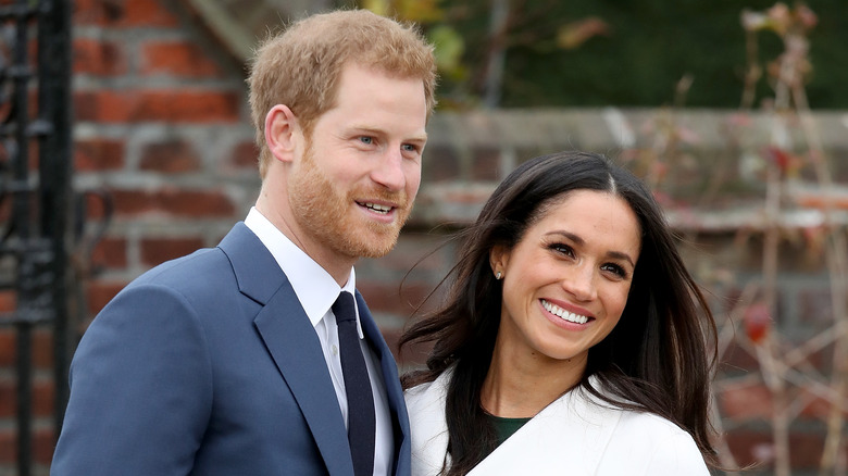 Meghan and Harry smiling 