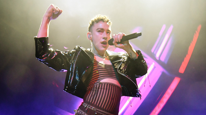 Olly Alexander of Years & Years singing into mic