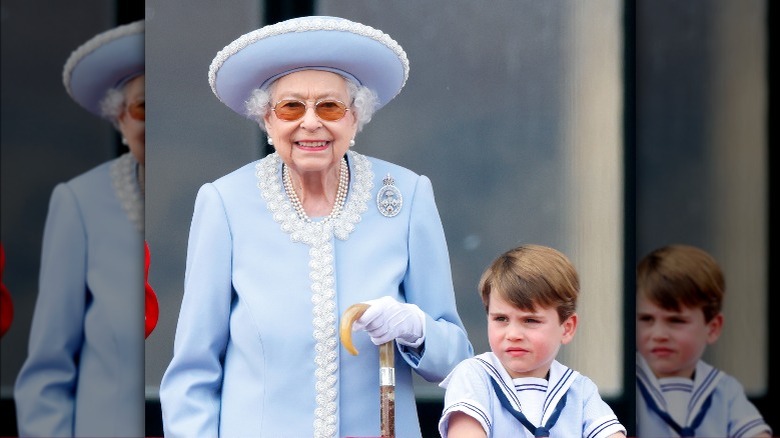 Queen Elizabeth with Prince Louis in his sailor suit