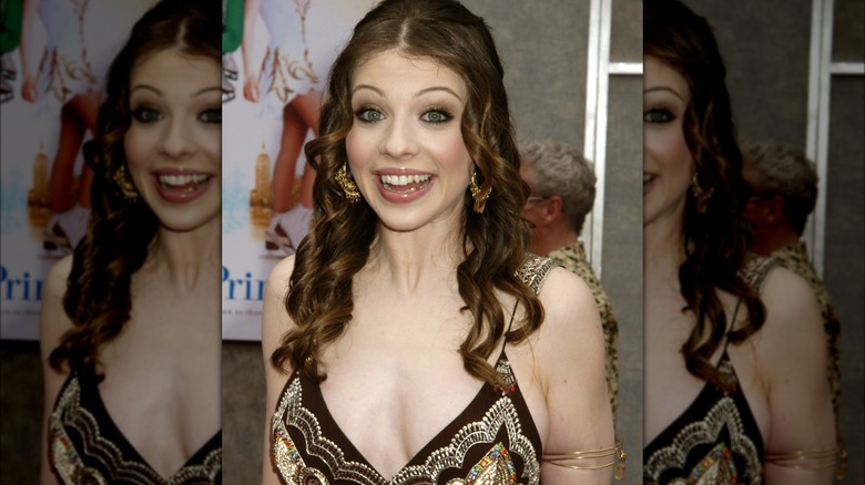 Michelle Trachtenberg posing