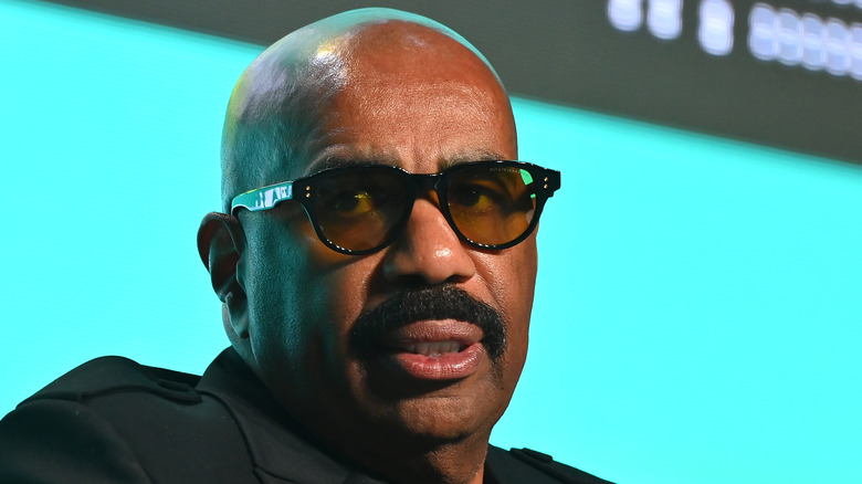 Steve Harvey speaks onstage during 2022 InvestFest