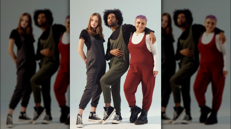 Models wearing unisex overalls