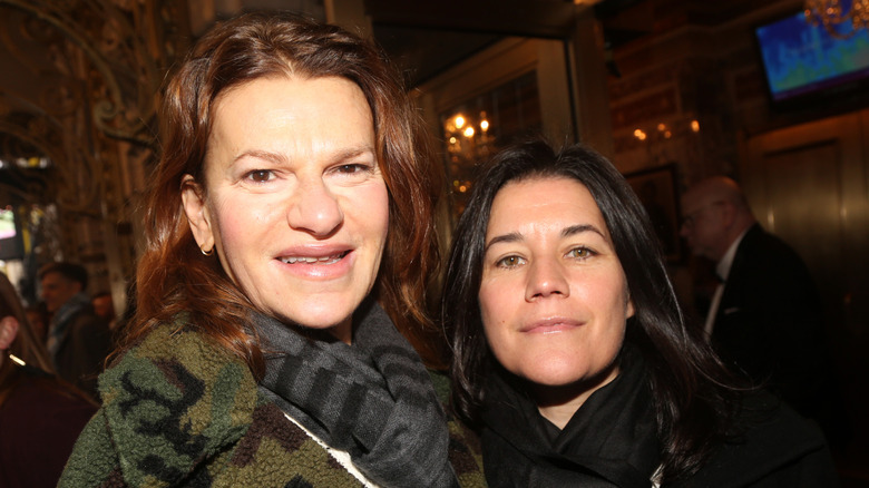 Sandra Bernhard and her partner Sara Switzer posing together