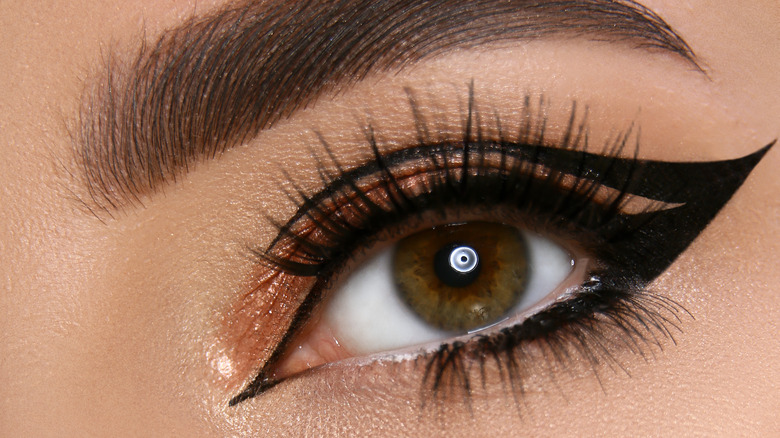 A woman wearing black graphic eyeliner 