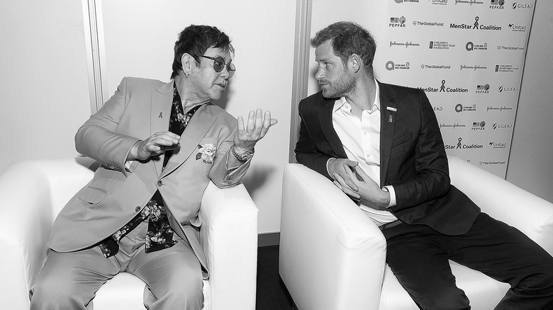 Prince Harry and Elton John posing