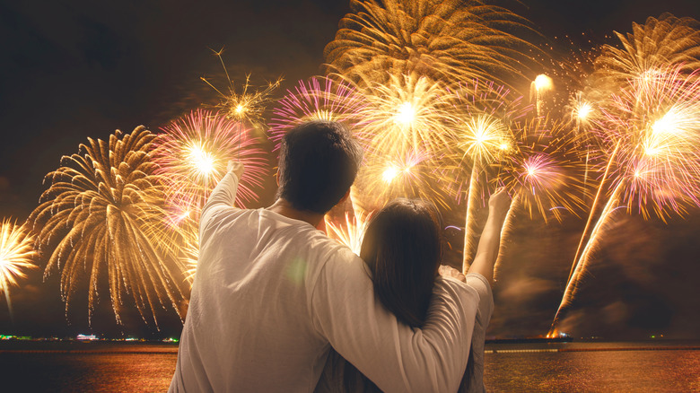 Couple watching fireworks together