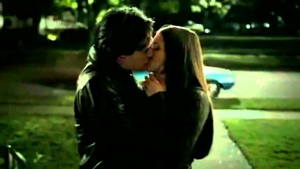 Damon and Elena smooching on The Vampire Diaries