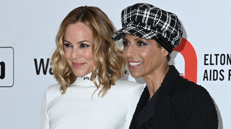 Maria Bello and Dominique Crenn smiling at an event