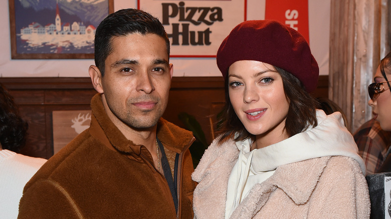 Wilmer Valderrama and Amanda Pacheco posing for photos