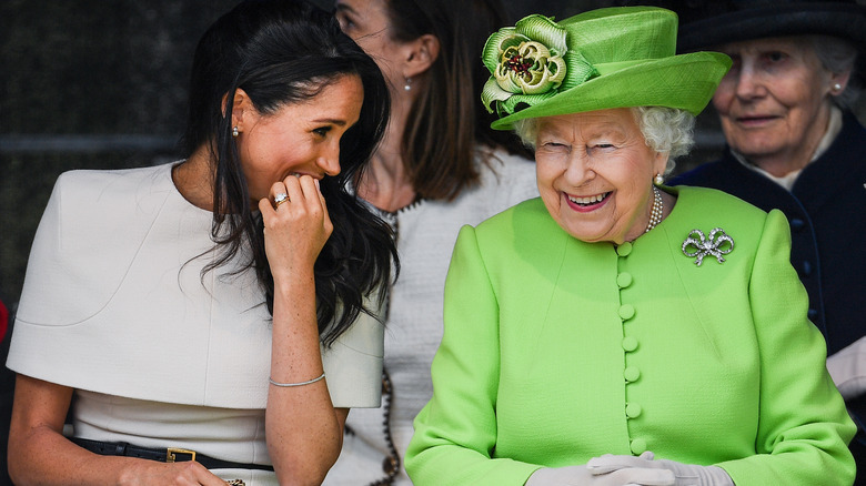 Queen Elizabeth shares a laugh with Meghan Markle