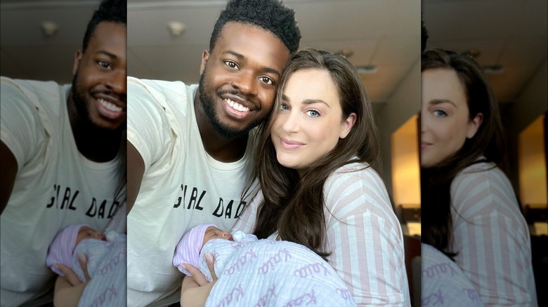 Kevin Olusola, his wife, and their baby