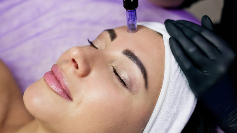 Woman getting a facial treatment