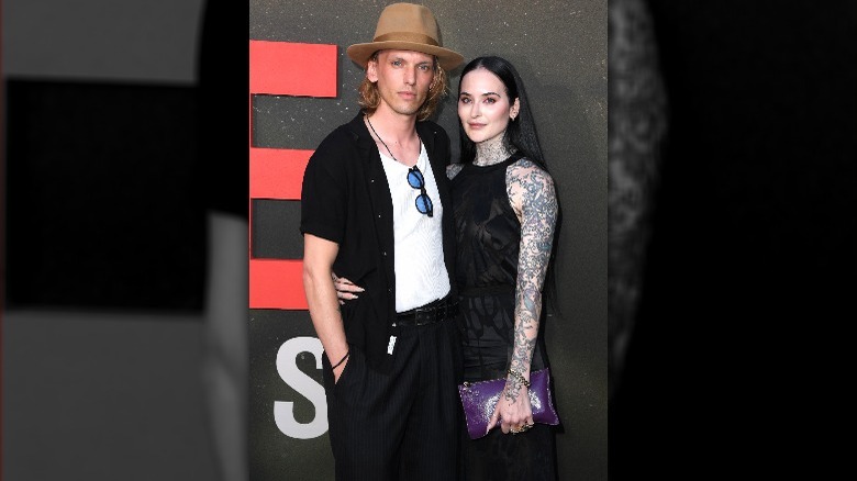 Jamie Campbell Bower and Jess Moloney at "The Black Phone" premiere