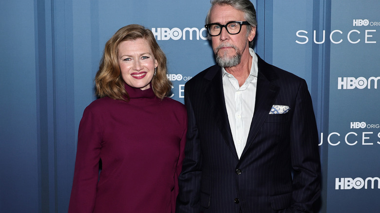 Mirielle Enos and Alan Ruck posing for camera