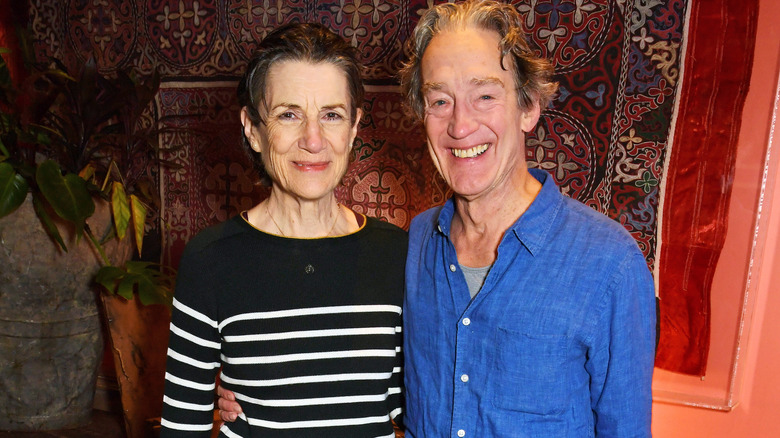 Harriet Walter and Guy Paul smiling and posing