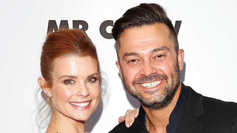 JoAnna Garcia Swisher and Nick Swisher smiling