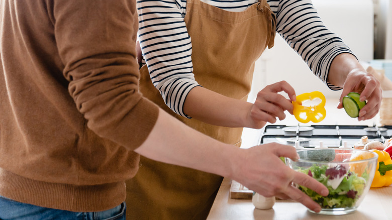 Happy couple cooking together