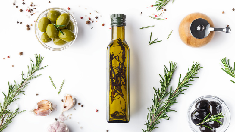 Bottle of rosemary oil, rosemary