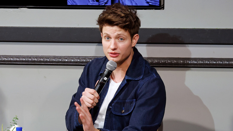 Matt Rife speaking into a microphone