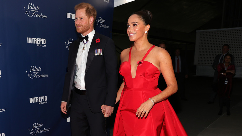 Prince Harry and Meghan Markle arriving at a 2021 function