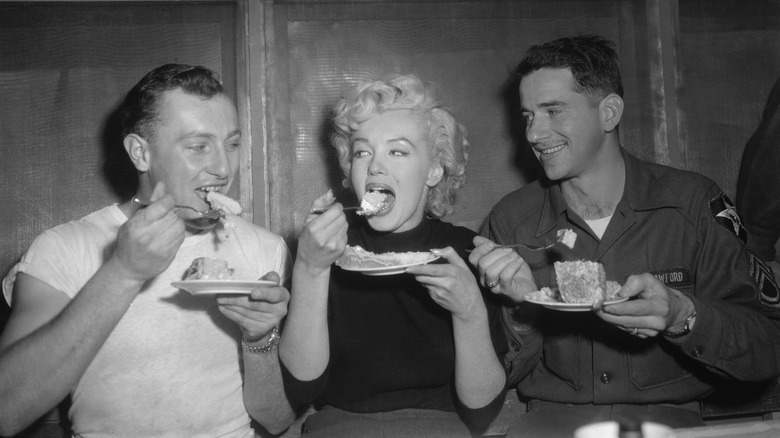 Marilyn Monroe eating cake