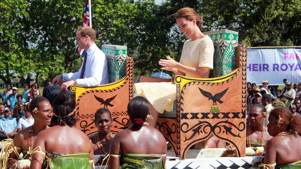 Prince William Kate Middleton carried on thrones