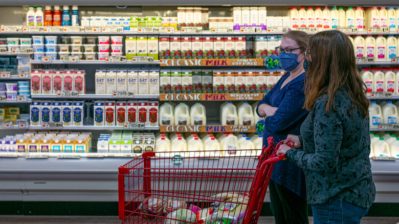 Two women in grocery store