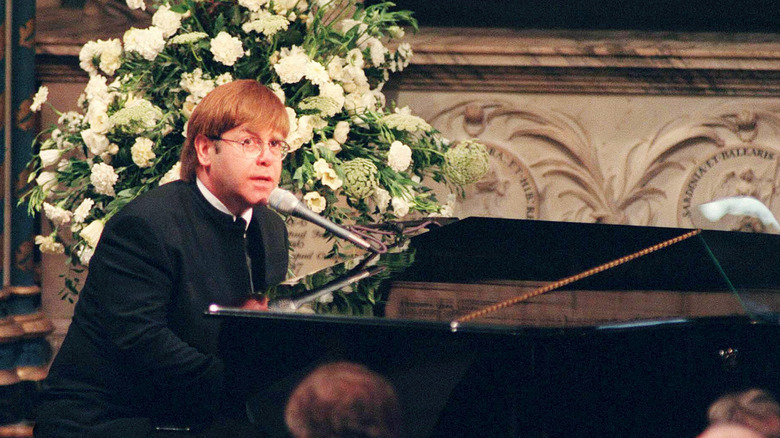 Elton John performing at Diana's funeral 