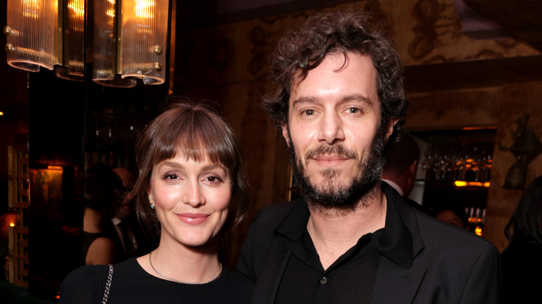 Leighton Meester and Adam Brody posing for a photo