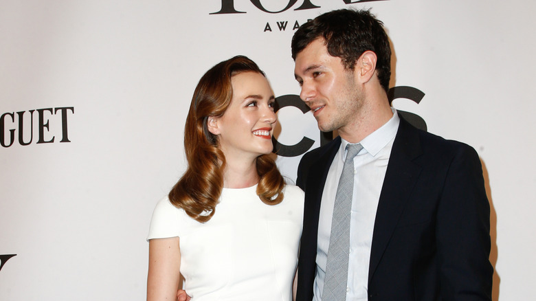 Leighton Meester and Adam Brody looking at each other lovingly