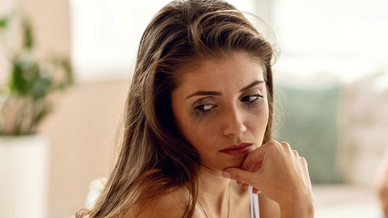 woman with smudged makeup