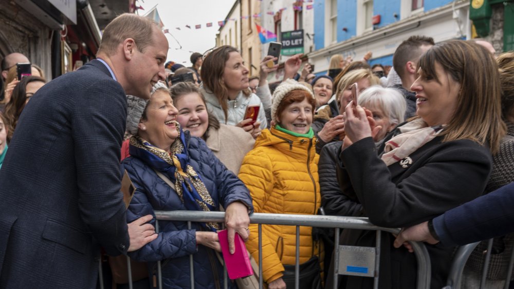 royal Prince William taking a photo